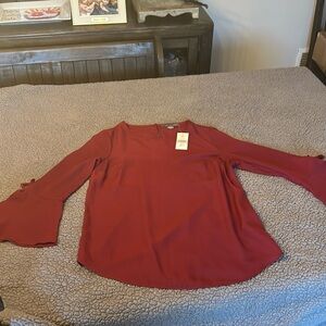 Wine color size small top new with tags bell sleeve